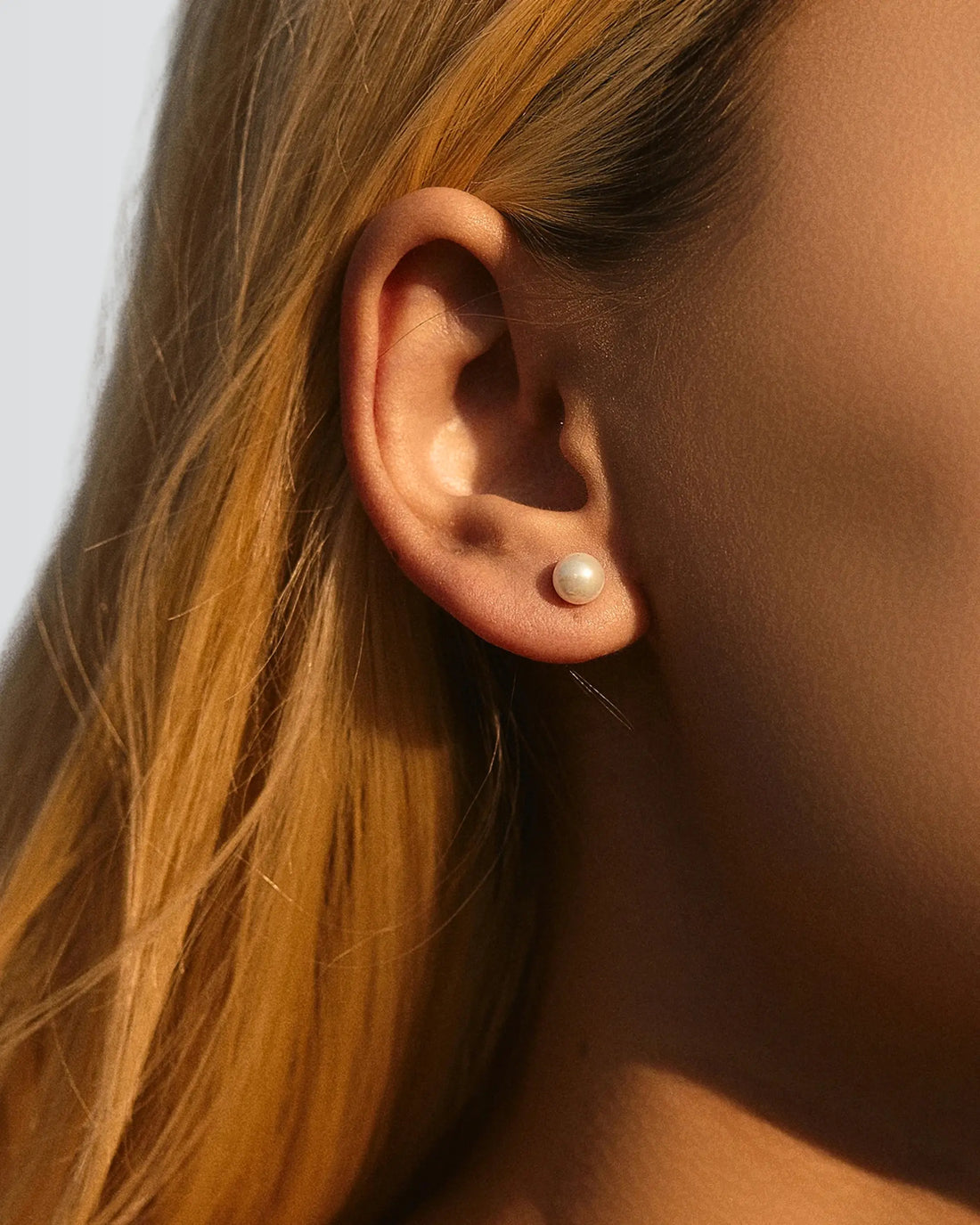 Gleaming Pearl Studs - Silver Earrings by BLINGLANE