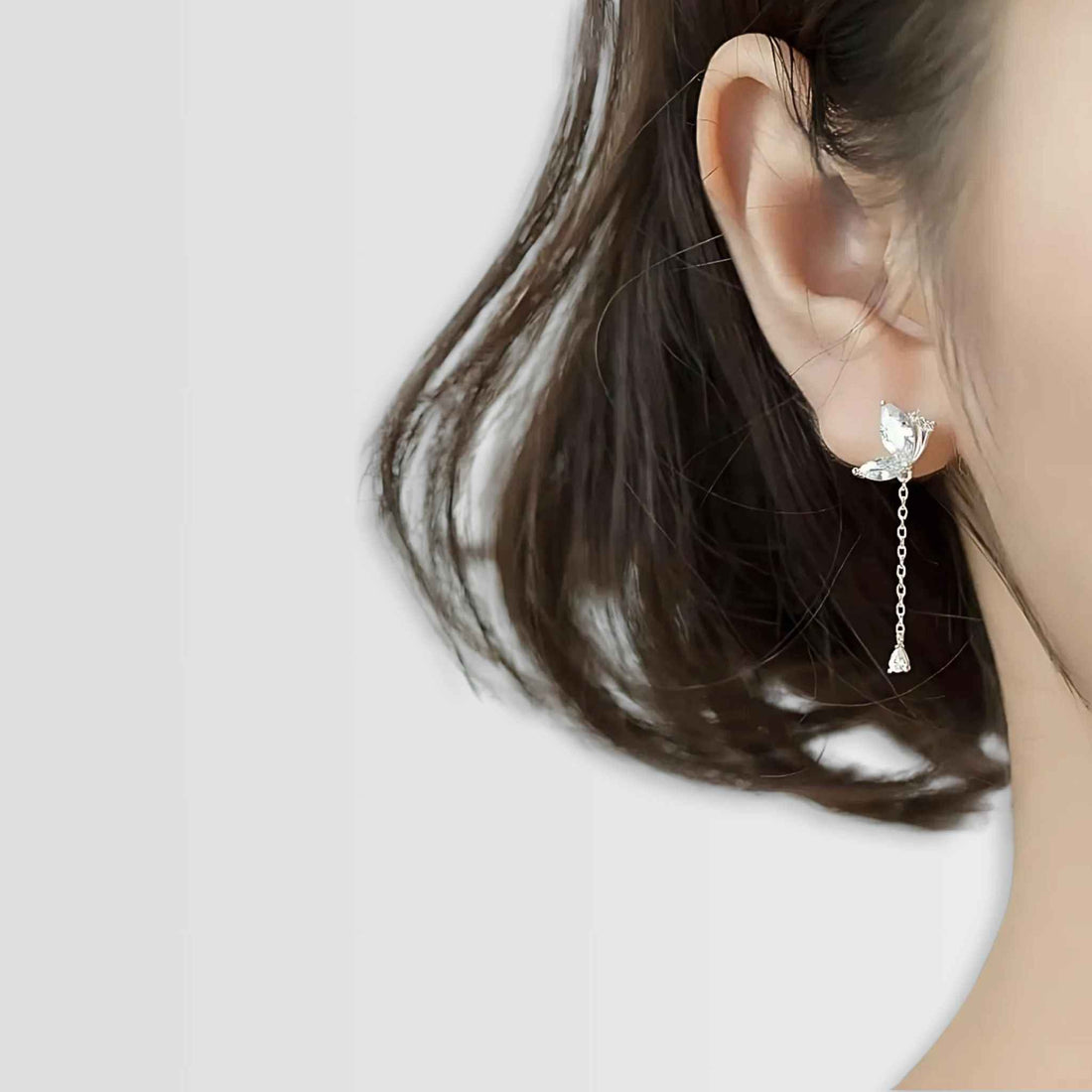Glitterati Butterfly Chain Earrings - jewellery by BLINGLANE