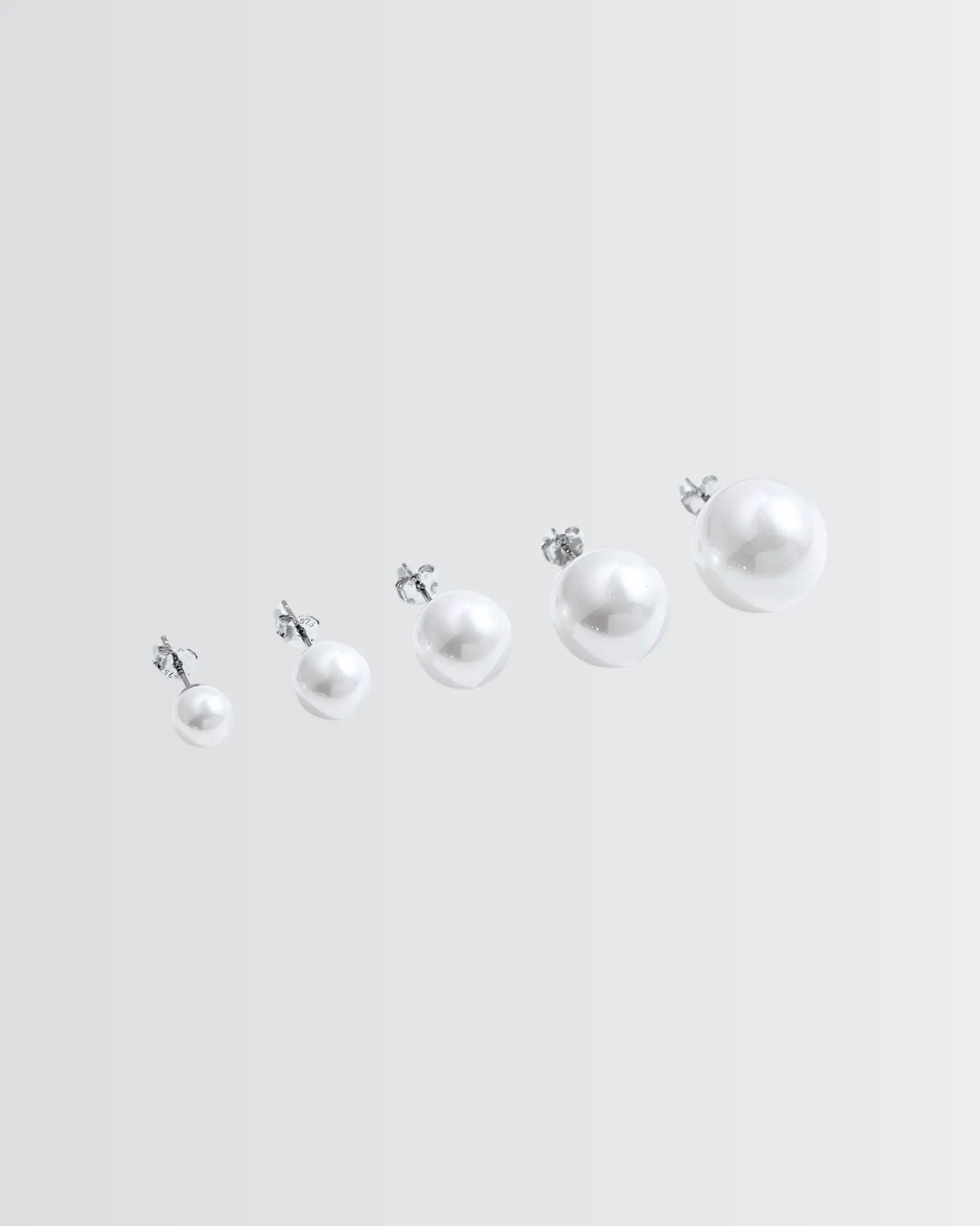Gleaming Pearl Studs -  Silver Earrings by BLINGLANE