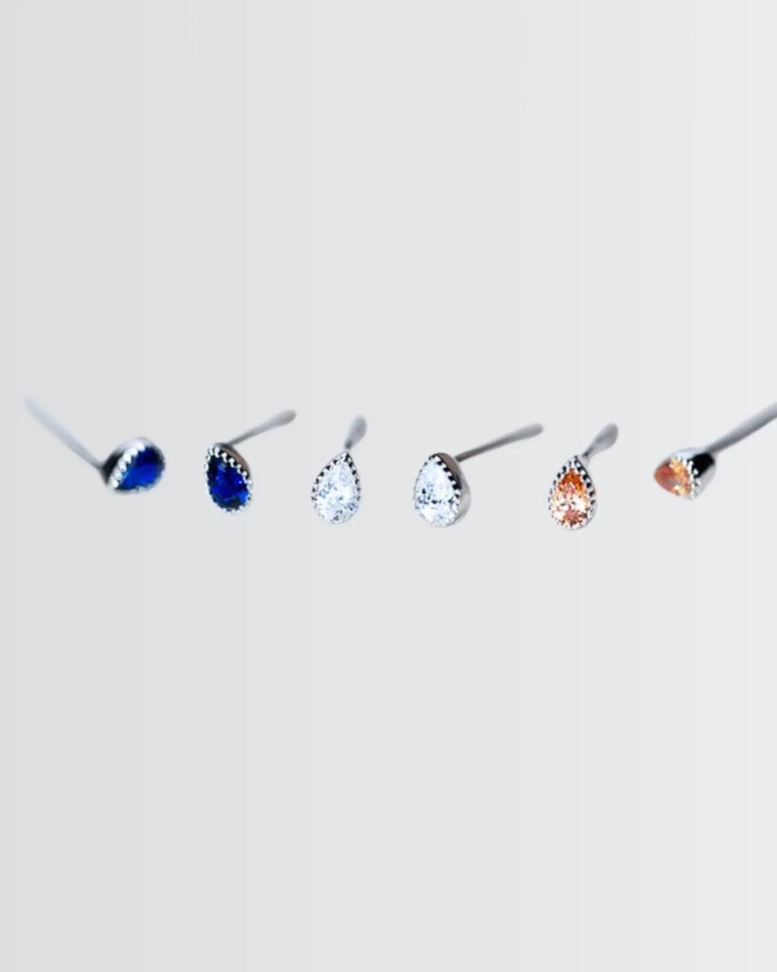 Radiant Teardrop Mini Studs -  Silver Earrings by BLINGLANE